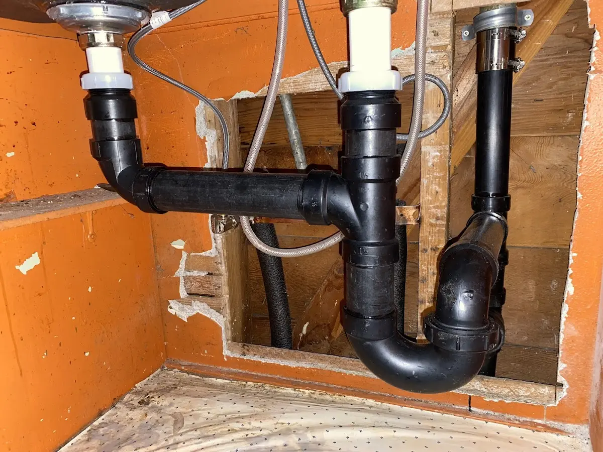 Professional Garbage Disposal Repair equipment and tools on the job in Woods Creek